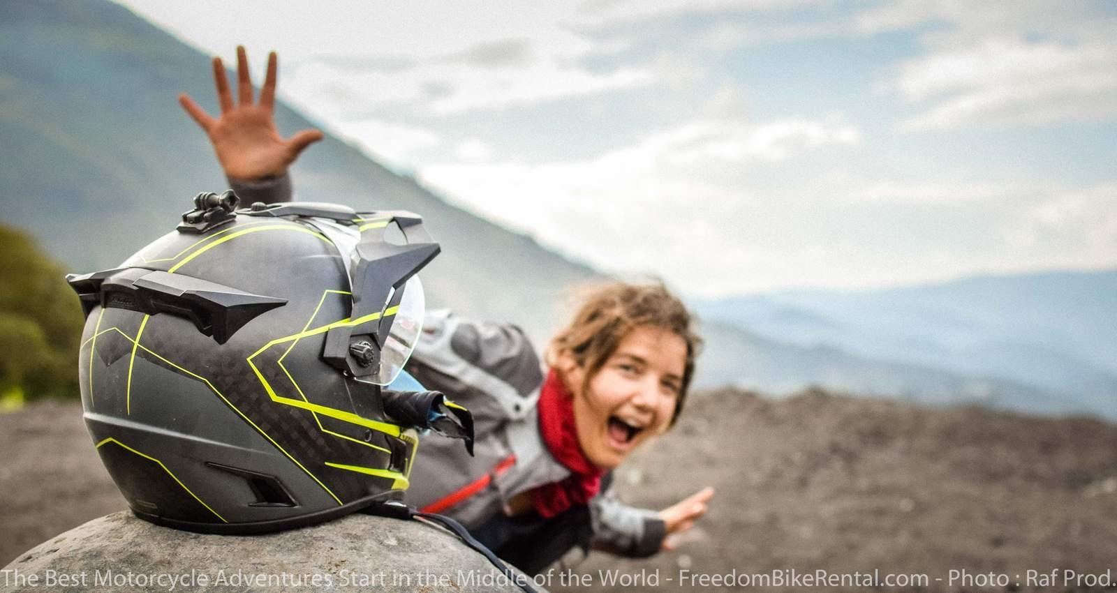 Happy woman motorcyclist on Ecuador Freedom Motorcycle Adventure