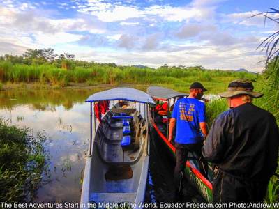 ready to board a motorized canoe on the napo river