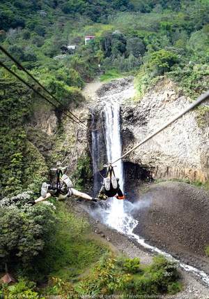 ziplining in motorcycle gear across the pastaza river in ecuador