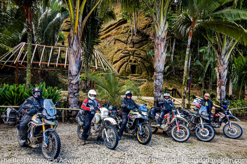motorcyclist overlooking secluded beach in northern Ecuador
