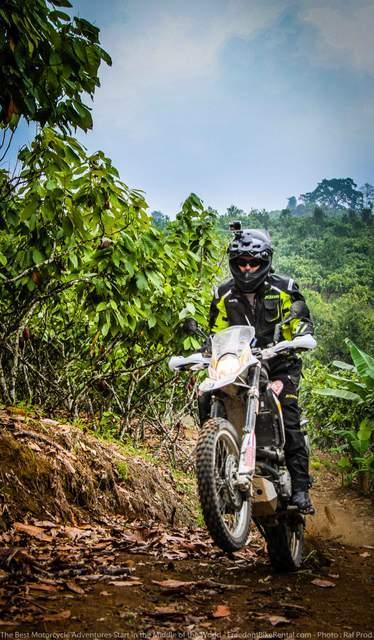 Doing a wheelie in a chocolate plantation in Ecuador