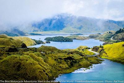 high altitude road through lake motorcycle tour in ecuador