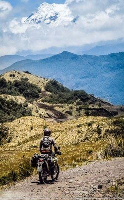 dirt deluxe dirt bike motorcycle tour ecuador looking at cayambe