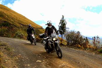 Riding a BMW F800GS on dirt road in Ecuador